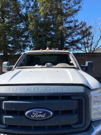 Auto glass work — new windshield set and sealed on Nissan Altima