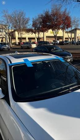 Completed auto glass job — spotless install ready for the road