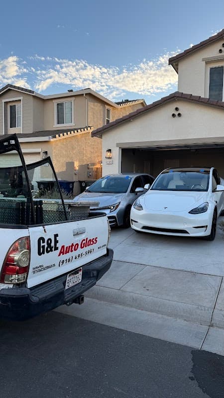 Front windshield installation — OEM glass on compact car